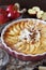 French cuisine. Red apple clafoutis, almonds dressing