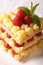 French cuisine: strawberry millefeuille with custard close-up
