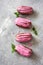 French eclairs with fruit pink glaze