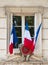 French flags on window