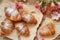 French fresh crusty croissants on a wooden table top view