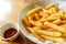 French fries closeup over wood