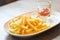 French fries dish and ketchup dip