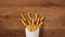 French fries filling a paper holder bag