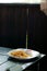 French fries, forks, table. French fries on an outdoor cafe table