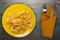 French fries on a plate on a wooden background.fast food top view.junk food