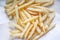 French fries on white blotting paper oil