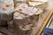 French heartshaped neufchatel cow cheese for sale in farmers dairy shop, french text on lables means Neufchatel cheese, made from