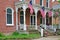 French Italianate mansion with flags