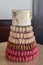 French Macaron Tower With Gold World Map Wedding Cake On Top
