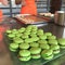 French macarons. Cooking green macaroons cookies photo