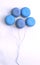 French macaroons blue flat lay in the form of balloons on strings