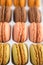 French macaroons, varied selection, colorful. Vertical photo