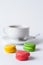 French multicolored cakes macarons in the foregroun