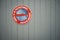 French  no parking sign ,on grey garage door.translation please no parking exit for cars