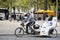French people biking bicycle rickshaw waiting travelers use service