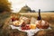 French picnic in autumn with mont saint-michel on background. Generative AI