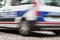 french police car in the traffic - emergency concept blur car