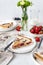 French quiche with strawberries. Traditional French pie. Open berries pie. Seasonal berries