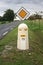 French road sign and bollard
