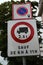 French road traffic signs indicating paid parking and a driving ban for trucks at certain times