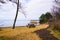 French Sanguinet lake wooden table and wood bench in sandy beach in France