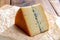 French semi-soft cow milk cheese morbier from Franche-Comte region with thin black layer and strong aroma