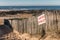 French sign Unguarded beach on wood fence