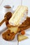 French soft spicy cheese from cow \' s milk and items from the oliv