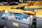 French street in Paris with dumpsters full with paper