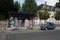 french streetview with newspapers kiosk and citroen ugly duckling