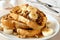 French toast with bananas, walnuts and maple syrup