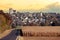 French Town and fileds corn. Black Tiles of Roof in the French Town, at Sunset