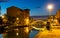 French town of Frejus overlooking embankment and marina at dusk