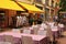 French traditional sidewalk cafe in Old Town of Nice, France.