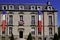 French tricolor and banner flag on mairie text building mean town hall in nantes in france