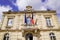 French tricolor and europa flag on mairie text building mean city hall in town center of Bouliac in france