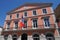 French tricolor flag on building city hall in town center of sete in france