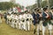 French troops march to Surrender Field at the 225th Anniversary of the Victory at Yorktown, a reenactment of the siege of Yorktown