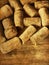 French wine corks close up on wood sepia vintage