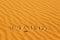 French word Maroc written on the sand