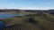 Frenchman Lake reservoir in California west shore hills and trees drone high POV photo
