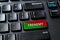 Frenemy word on the green red enter key of a desktop pc keyboard. Laptop computer enter key with warning message. Be an enemy