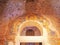 Fresco and arched doorway inside a Byzantine church