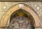 Fresco over a tombstone at one end of the Pilate courtyard in the Basilica of Saint Stephen in Bologna, Italy.