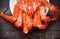 Fresh Alaskan King Crab Cooked steam or Boiled seafood on plate and wood background , Red crab hokkaido