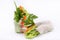 Fresh appetizing spring rolls with chicken on white background. Vegetarian.
