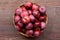 Fresh apples in basket. Autumn or winter rustic background.