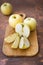 Fresh apples. Variety White pouring on a wooden cutting board