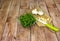 Fresh aragula and garlic on wooden background